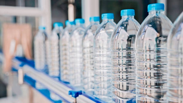 bottles on an automated conveyor belt