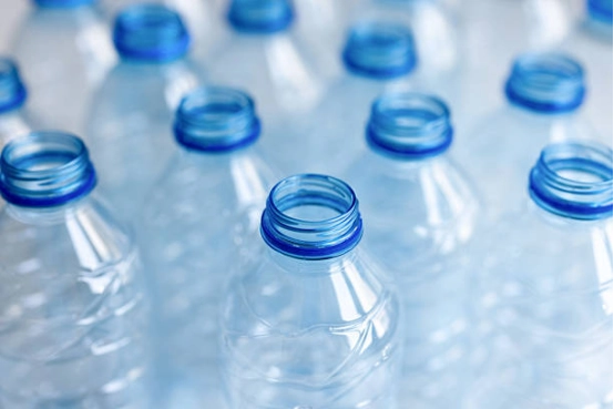 clear-water-bottle-blue-background